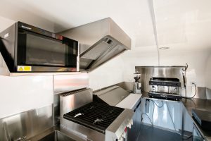 Inside the custom built Cabbage Tree Coffee food trailer kitchen.